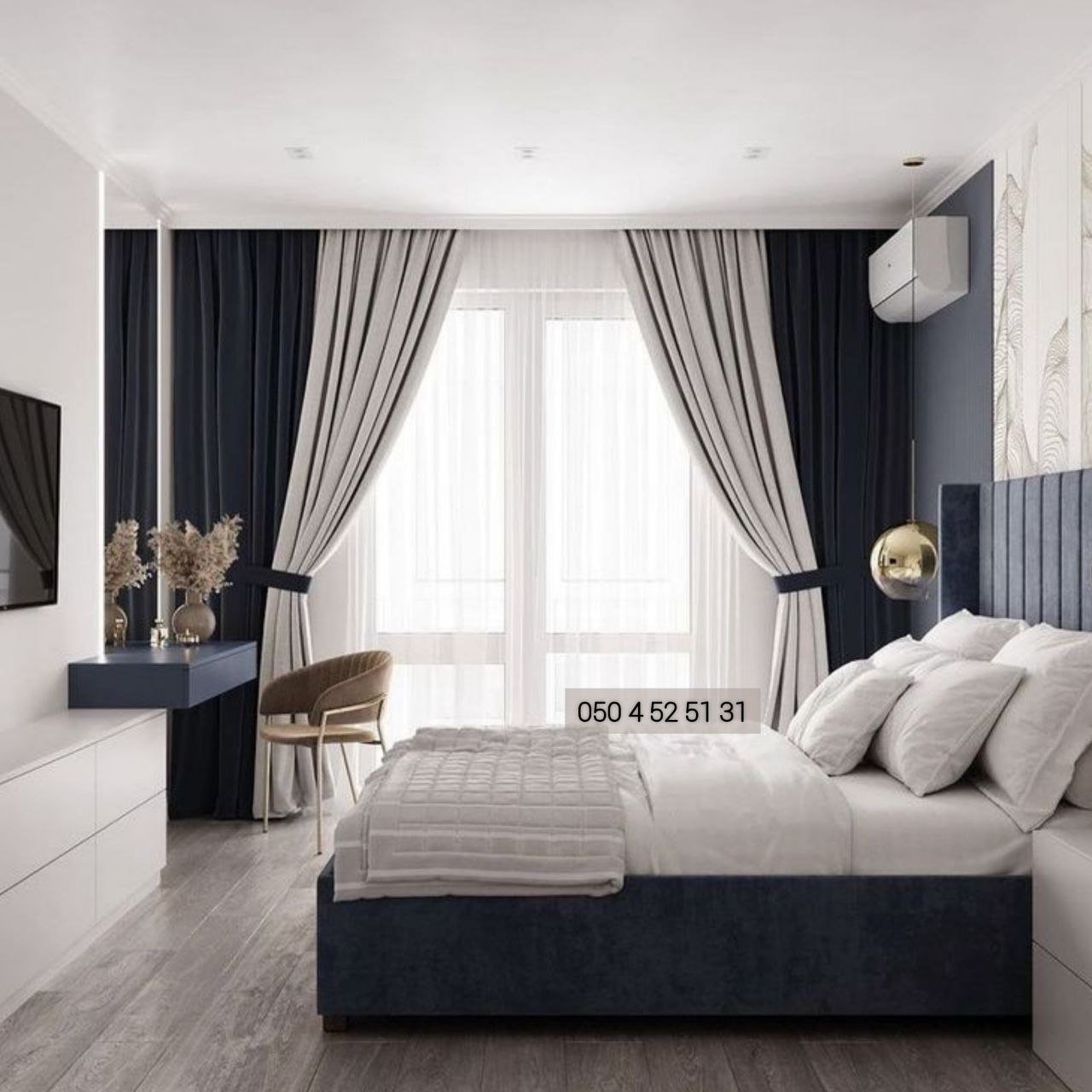 Navy blackout curtains with cream sheers in a modern bedroom